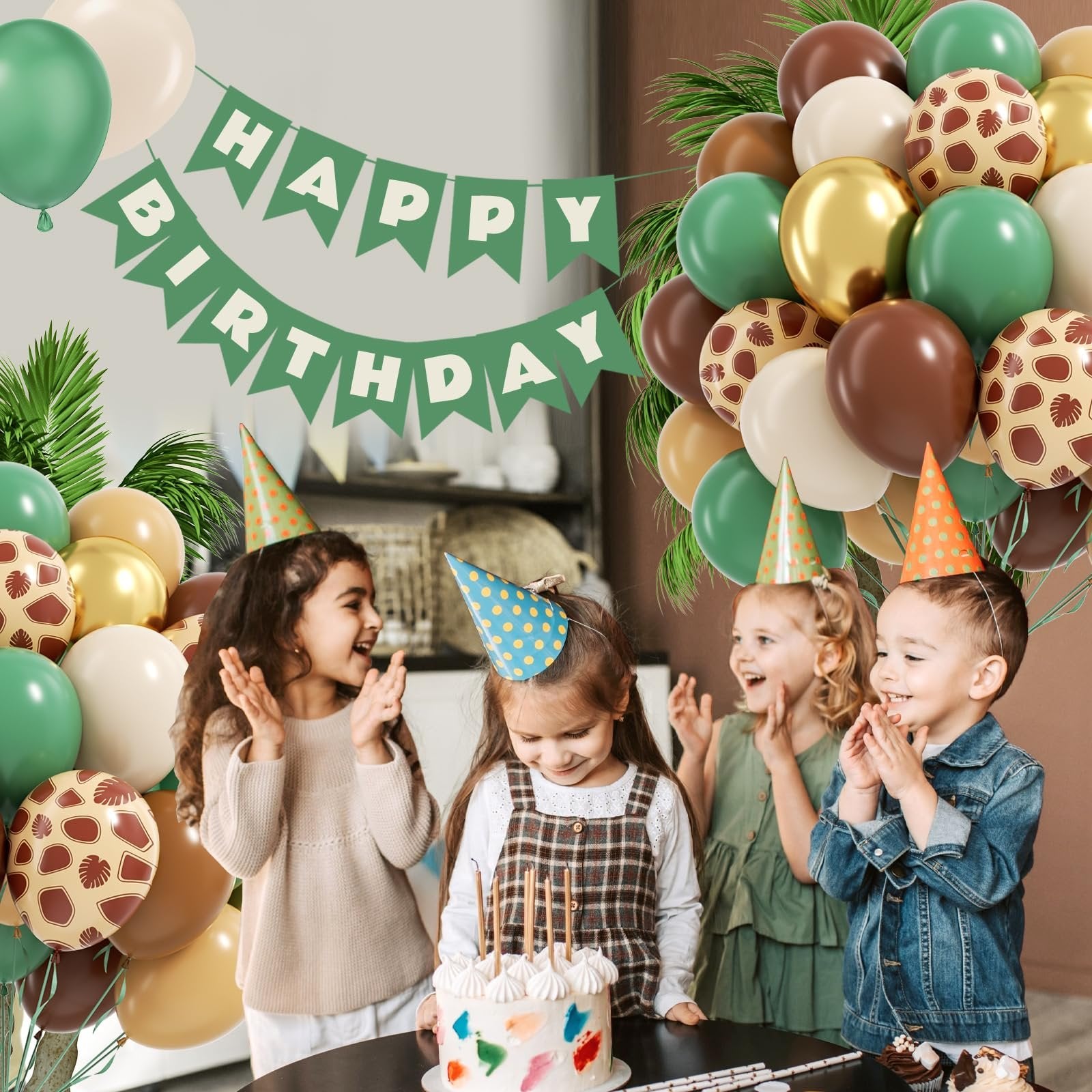Children celebrating a birthday with safari-themed balloons and a cake. A 'Happy Birthday' banner hangs in the background.
