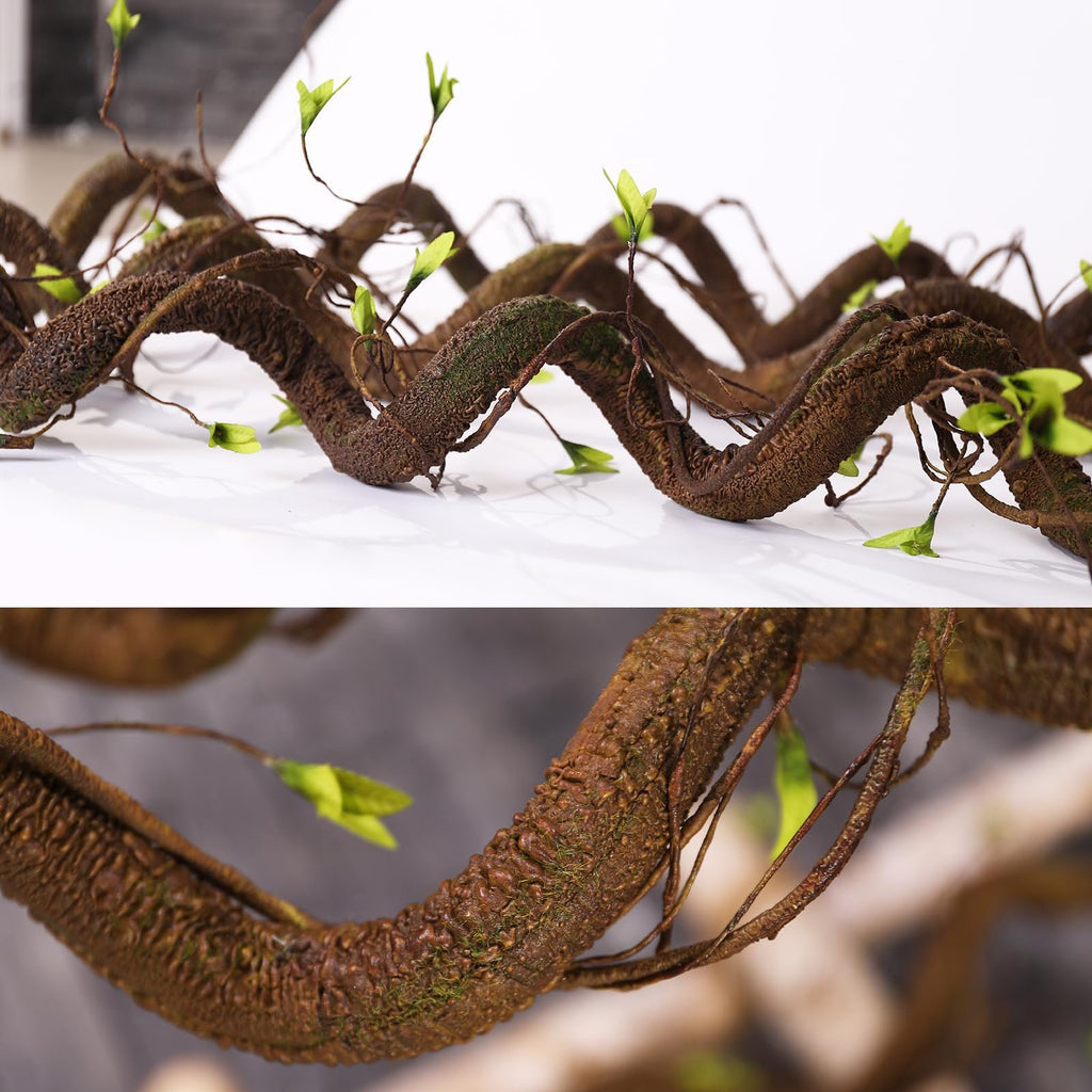 Close-up of bendable artificial tree vine garland with textured brown bark and small green shoots, displayed on a white surface.