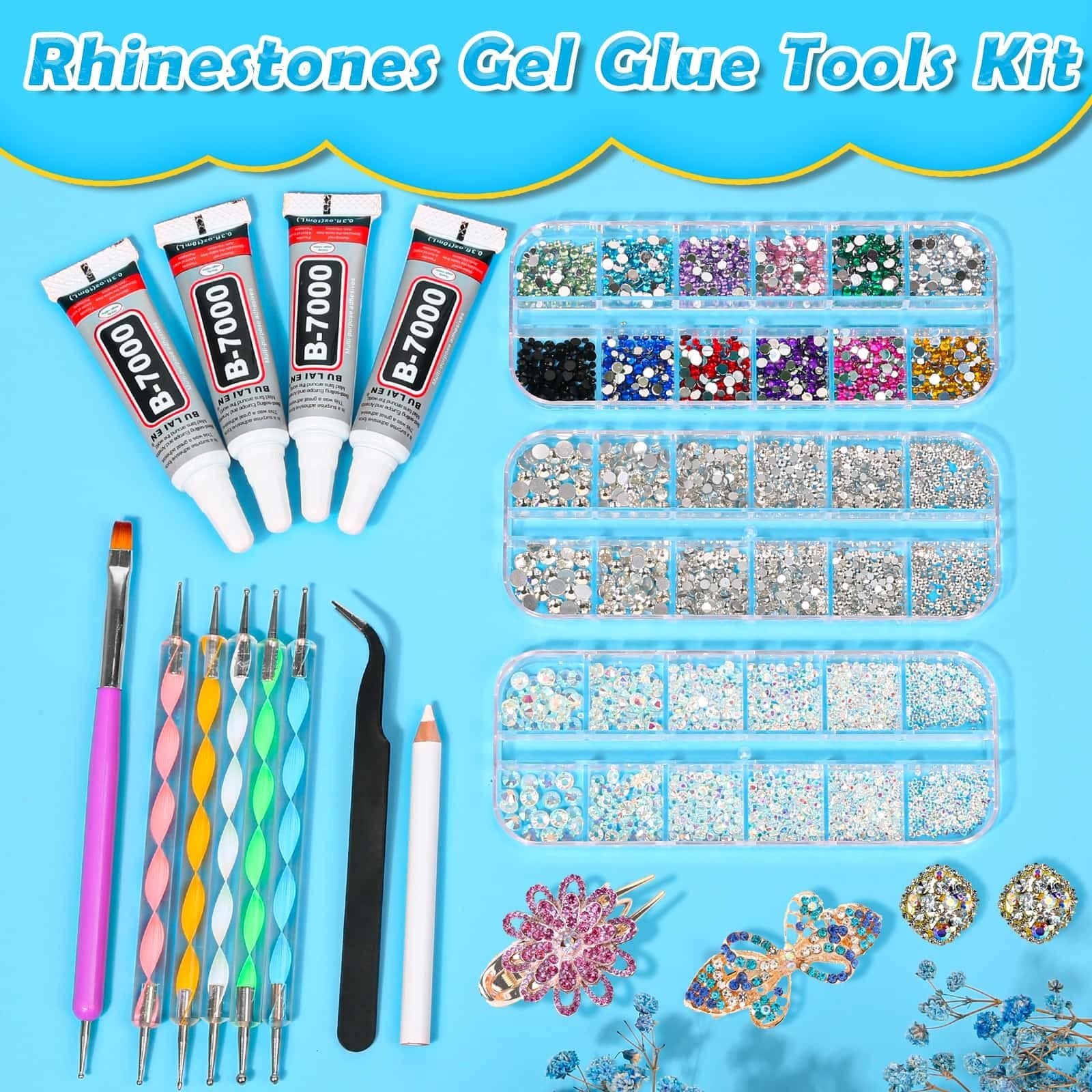 Rhinestone and B-7000 glue kit contents including tubes of glue, multiple compartments of rhinestones, dotting tools, tweezers, and a pencil.