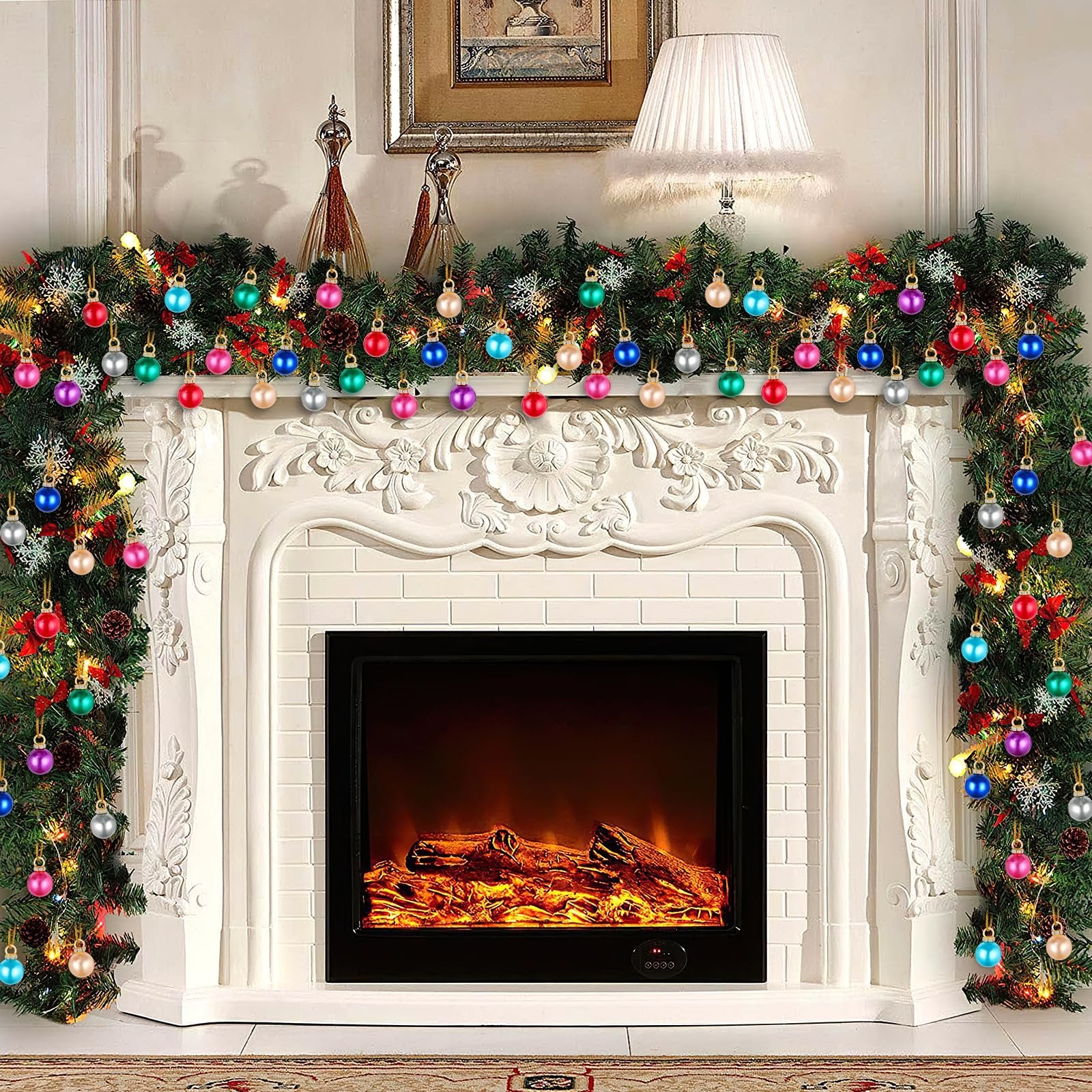 Christmas garland with colorful mini ornaments and lights draped over a fireplace mantel