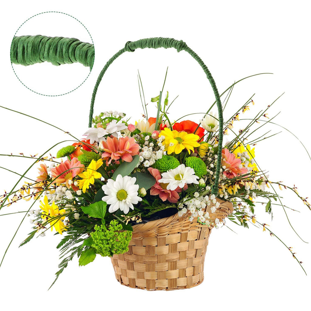 Floral arrangement in a woven basket with a close-up inset of dark green floral wire