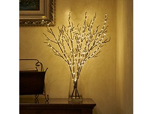 Brown twig garland with 120 fairy lights in a glass vase, displayed indoors.