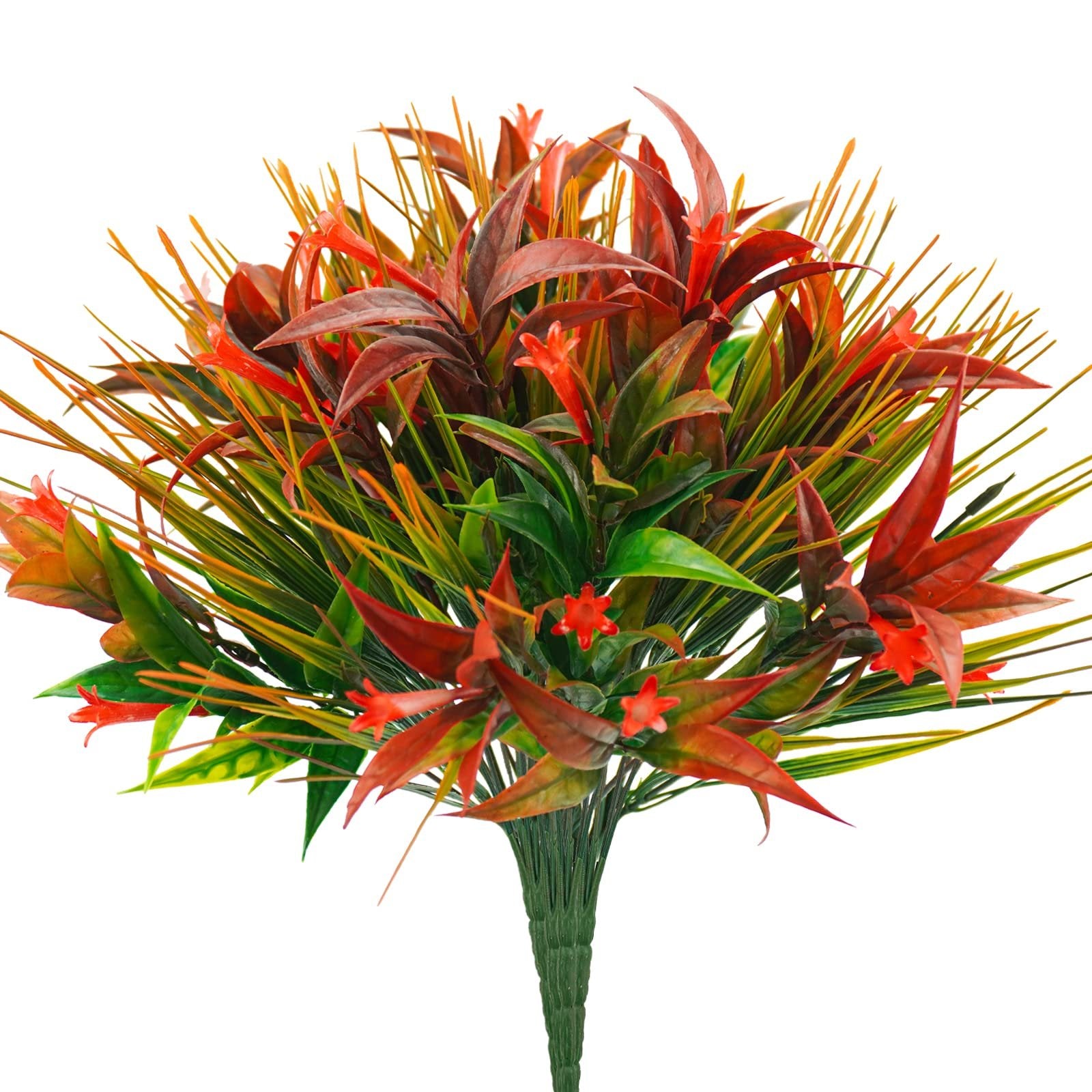 Artificial plant with red and green leaves and small orange flowers, on a white background.