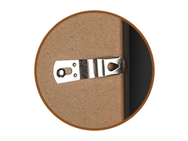 Close-up of a picture frame's metal hanging hardware attached to the backboard.