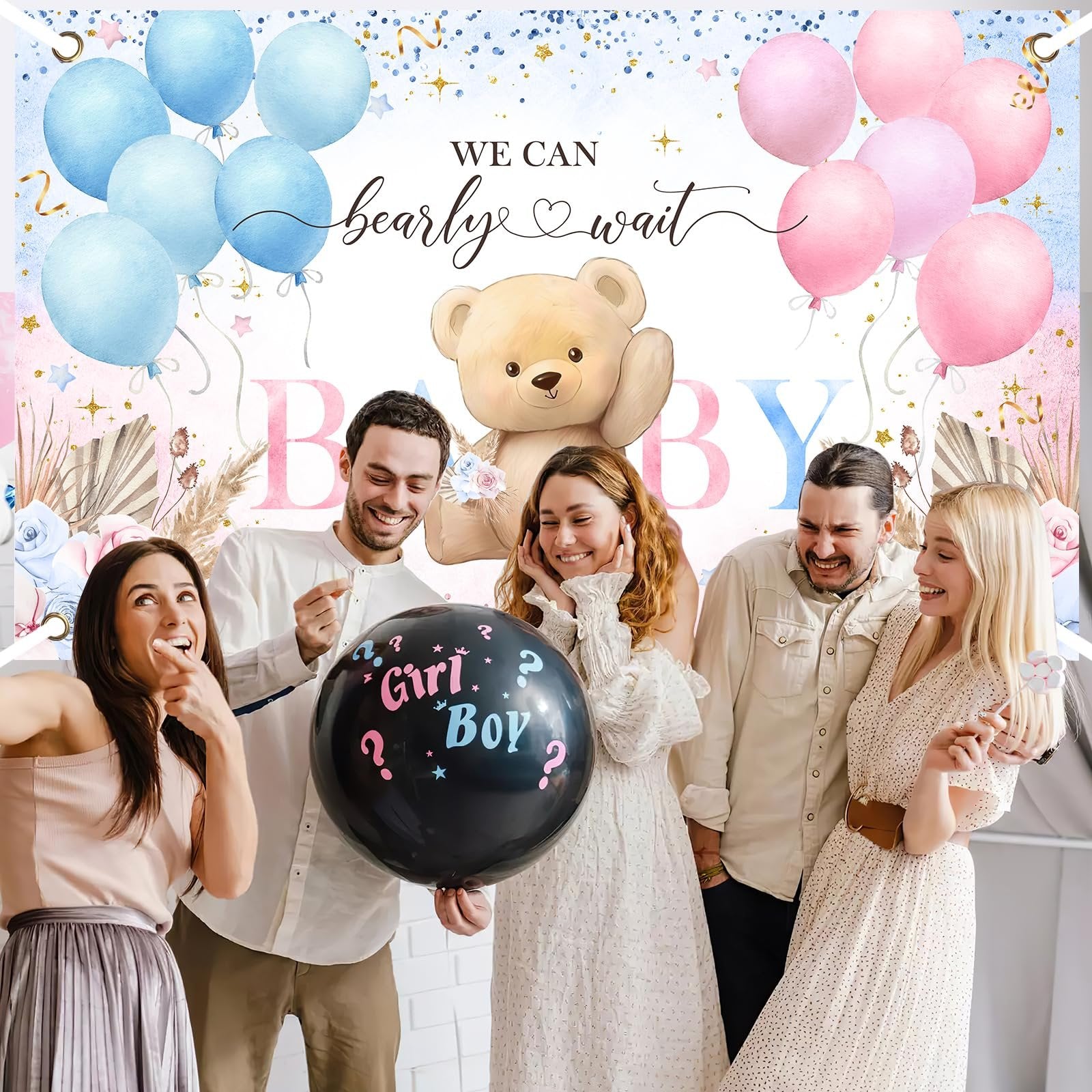 Group of people celebrating a gender reveal with a bear and balloons, holding a black balloon with 'Girl or Boy?' text.