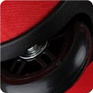 Close-up of a red Christmas tree storage bag with black wheels and a black handle attachment.
