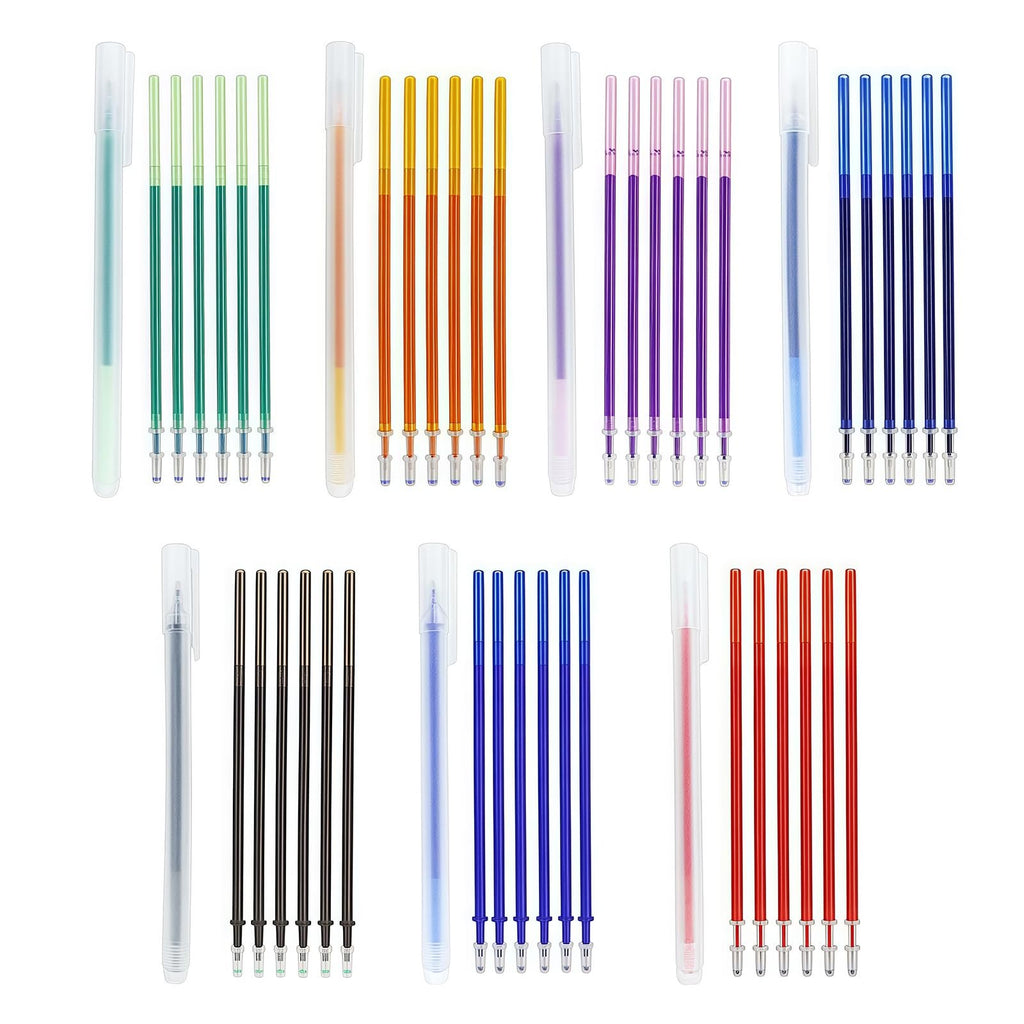 Set of heat erasable fabric markers and refills in various colors including green, orange, purple, blue, black, and red.