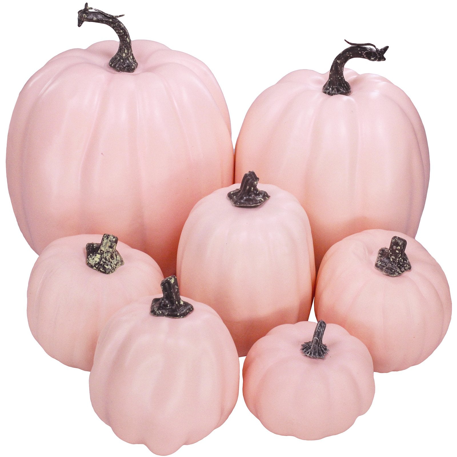 Group of seven assorted light pink foam pumpkins with dark resin stems on a white background.