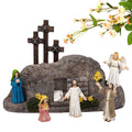 Easter Resurrection Scene tabletop decor with three crosses, tomb, Jesus, angel, and two women with flowers.