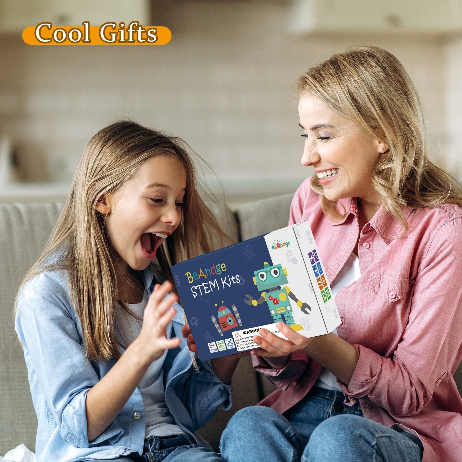Mother and daughter excitedly opening a STEM kit box featuring robots and colorful graphics.