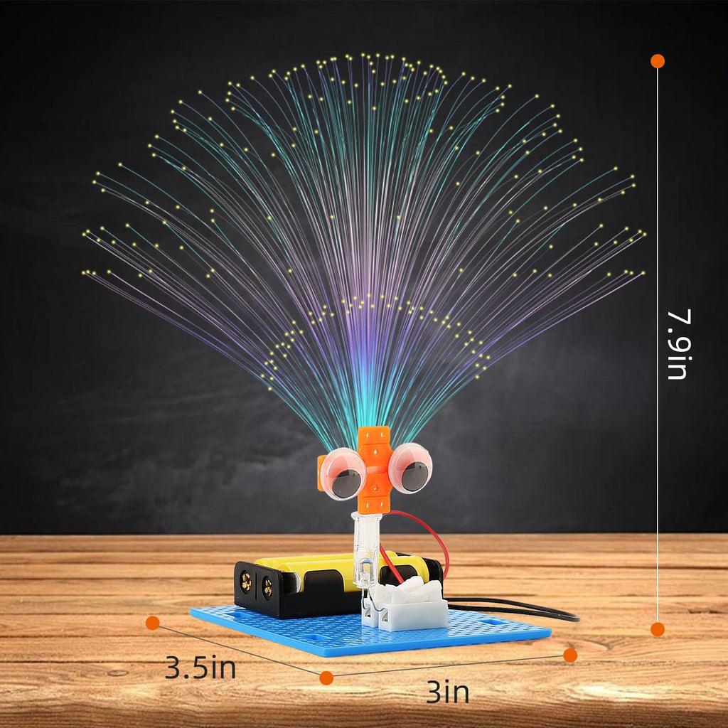 Fiber optic lamp STEM kit with battery pack and googly eyes on a wooden surface, showing dimensions 3.5in and 7.9in.