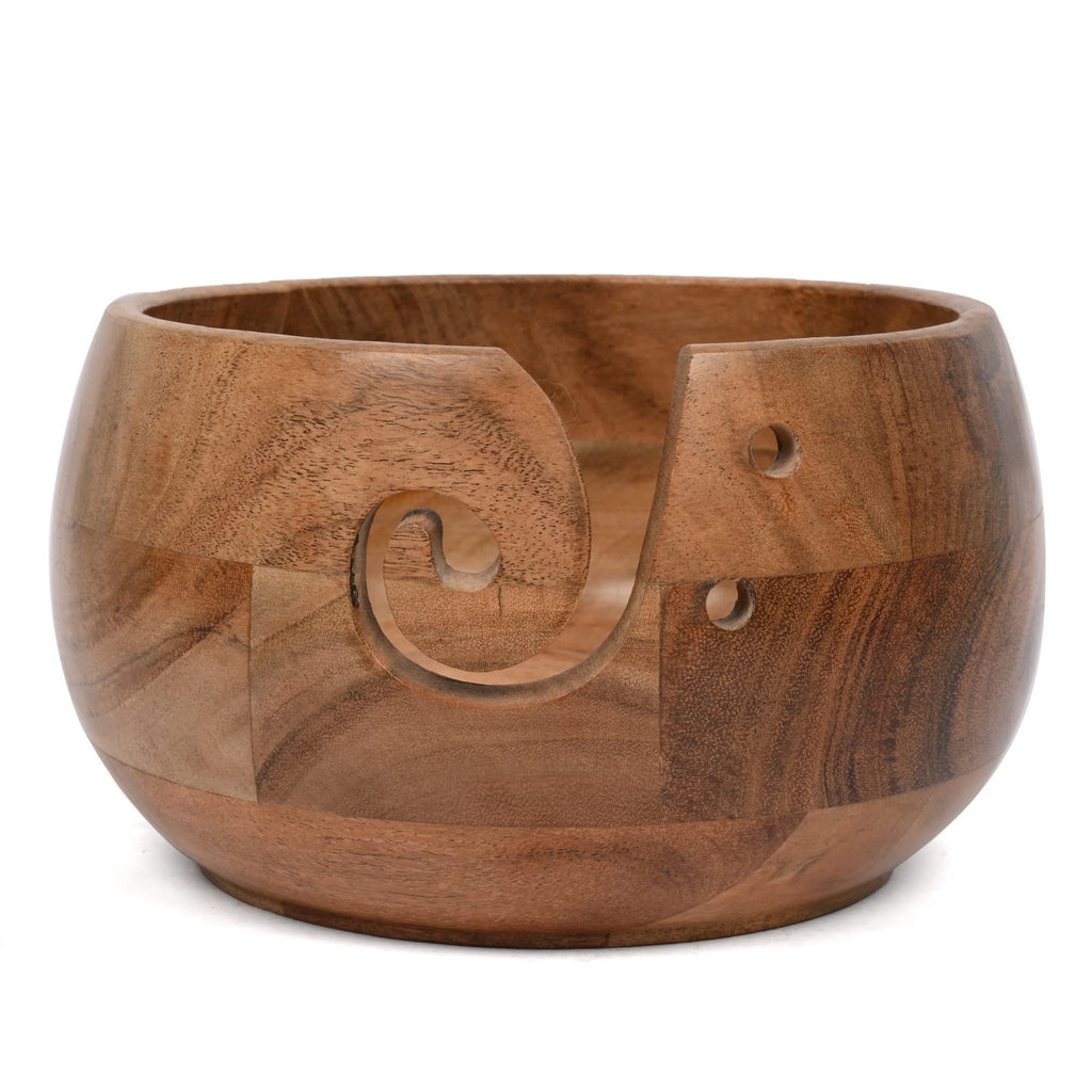Acacia wood yarn bowl holder with a carved swirl slot and two small side holes, shown from a front-side angle on a white background.