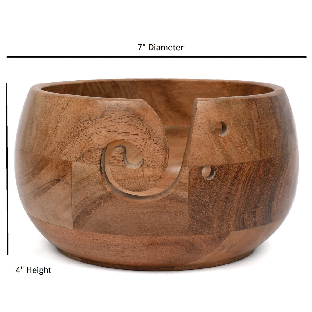 Acacia wood yarn bowl holder with carved swirl and side holes, shown with dimension callouts for diameter and height.