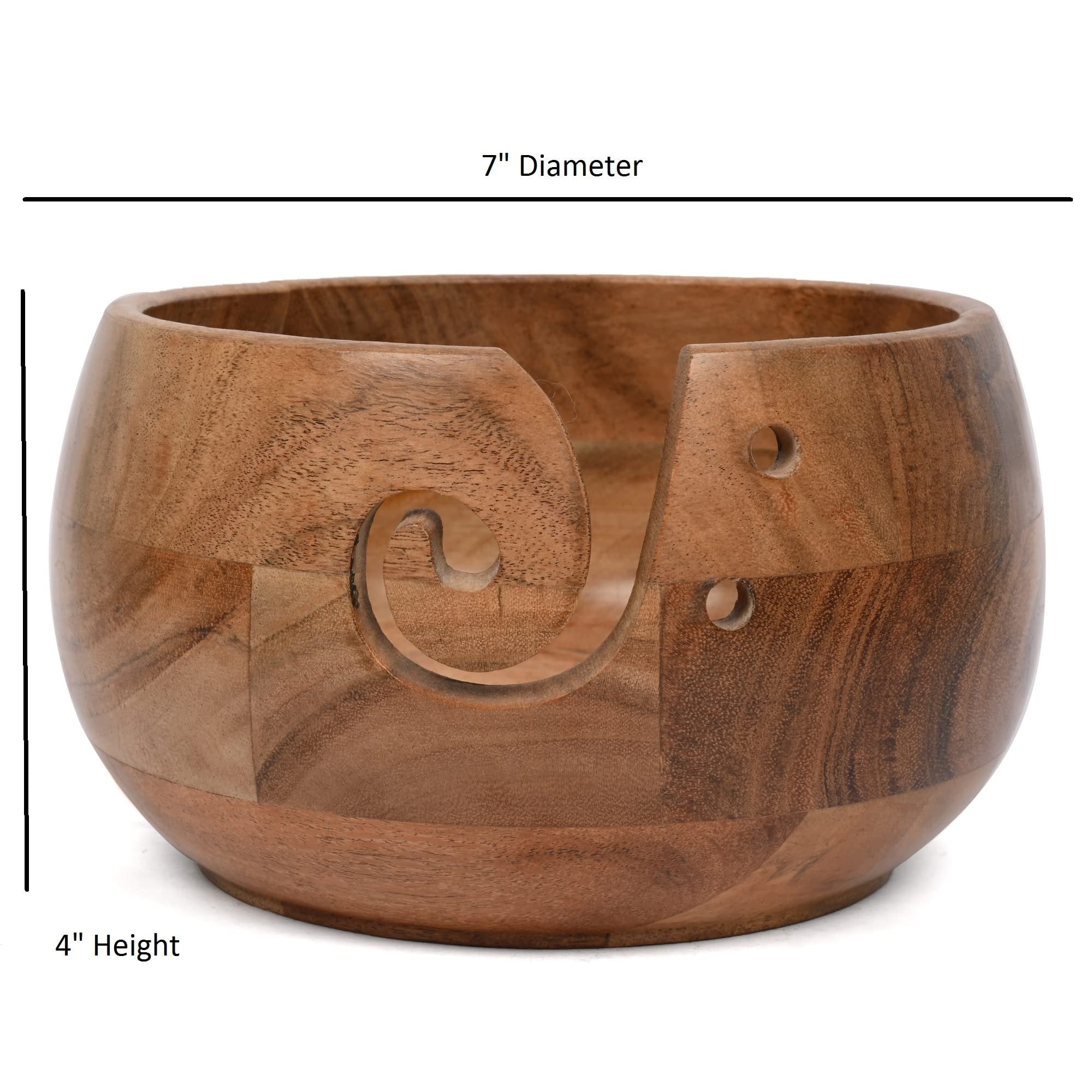 Acacia wood yarn bowl holder with carved swirl and side holes, shown with dimension callouts for diameter and height.