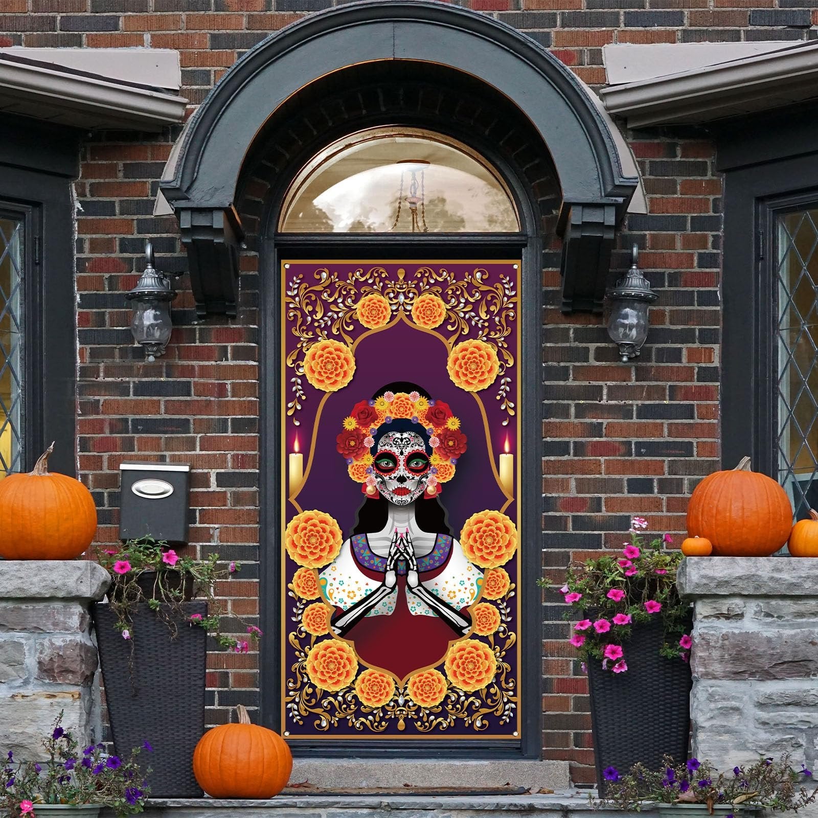 Day of the Dead door cover featuring a sugar skull woman with floral headdress, displayed on a brick house door with pumpkins and plants.