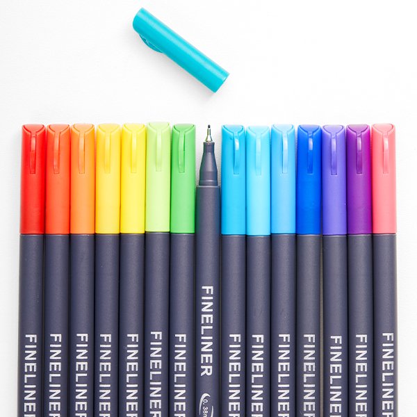 A row of 12 colored fineliner pens with caps on, plus one teal cap and one pen with its tip exposed, arranged on a white background.