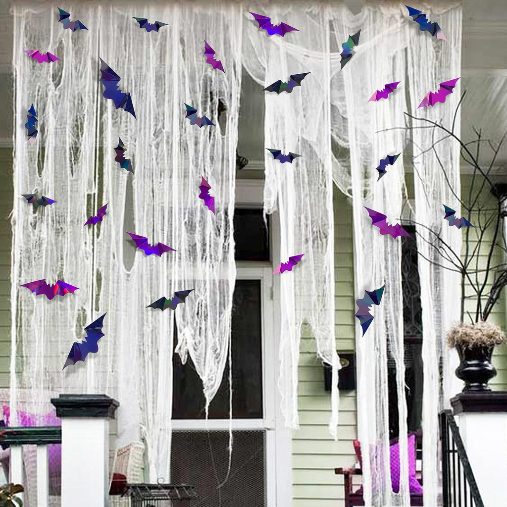 Iridescent 3D bat wall decals decorating a porch with white tattered fabric for Halloween