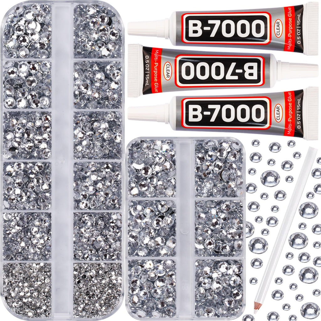 Flatback rhinestones in divided containers with three tubes of clear multi-purpose glue and a white pencil.