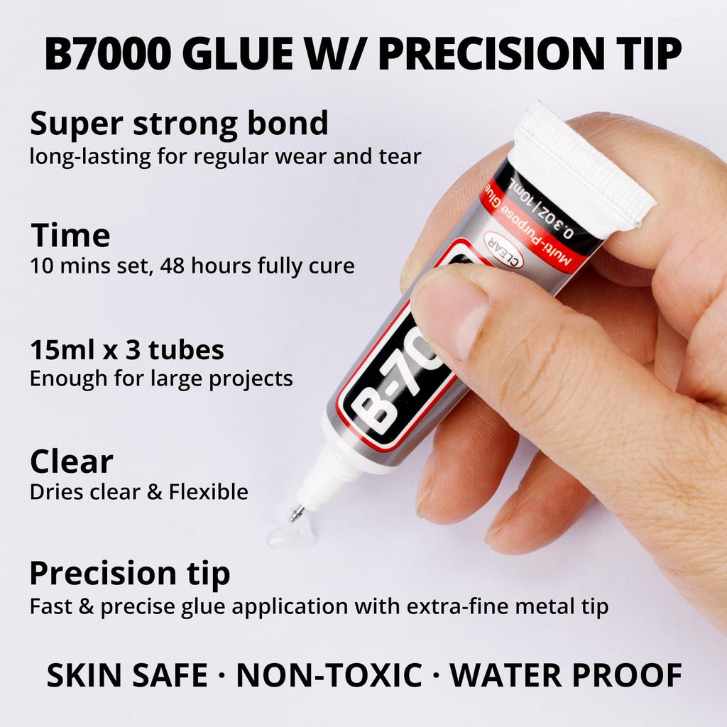 Hand holding a tube of clear multi-purpose glue with a precision tip, showing product features.