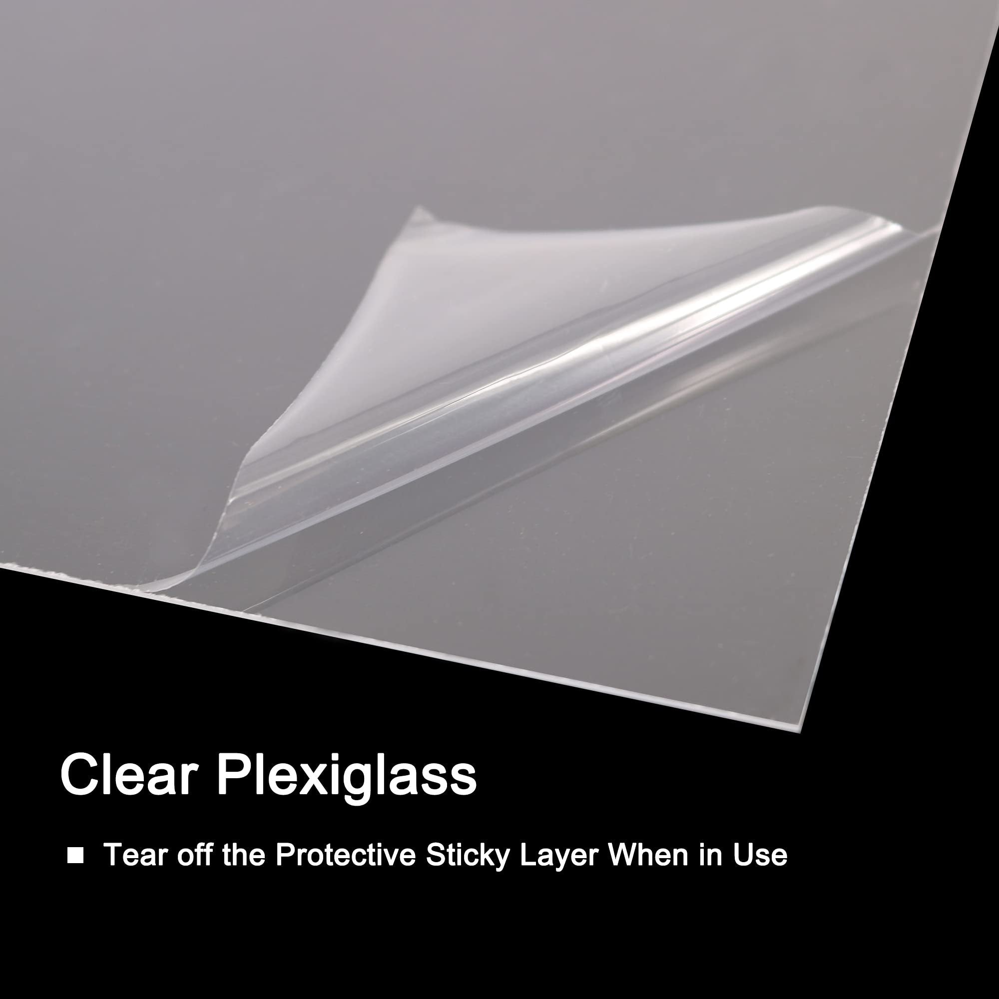 Clear plexiglass sheet with protective film being peeled back, showing a clean surface underneath.