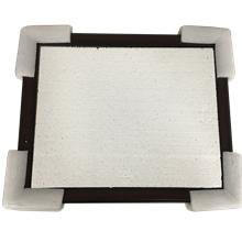 Diploma frame with protective corner guards, showing the back of the frame.
