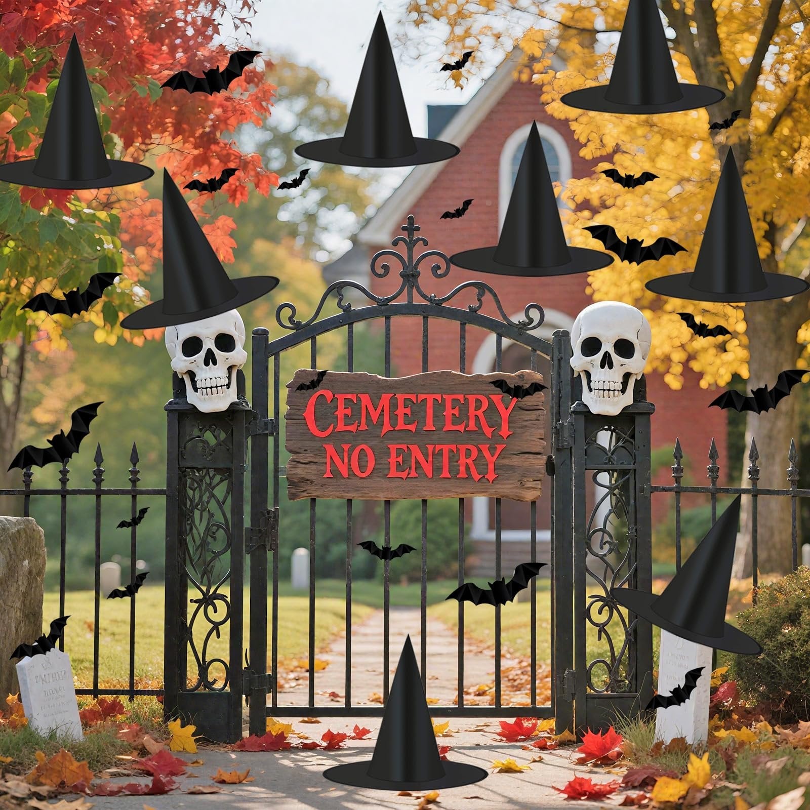 Halloween cemetery gate decorated with witch hats, skulls, and bats, featuring a 'Cemetery No Entry' sign.