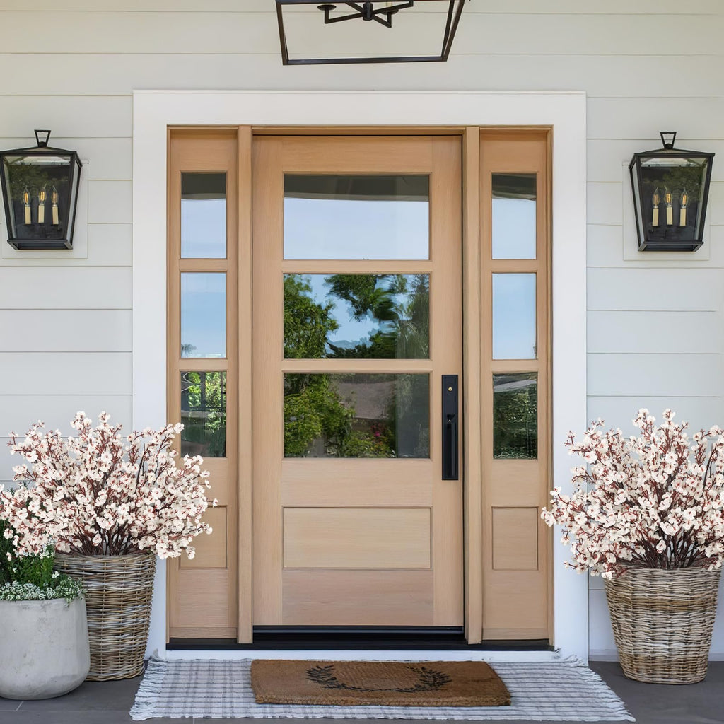 Front door with two large baskets of white baby's breath flowers on either side.