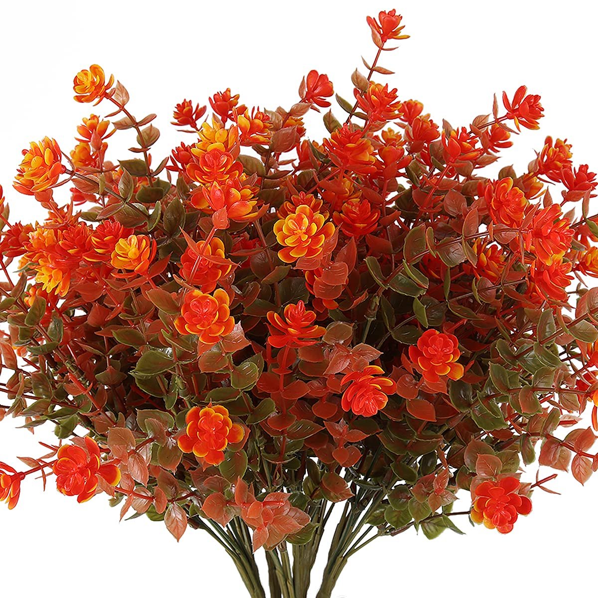 Bundle of artificial fall flowers with orange and yellow blossoms and green-brown leaves, shown from the front.