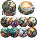 Diamond painting hummingbird coasters with holder and a cup of coffee on one coaster
