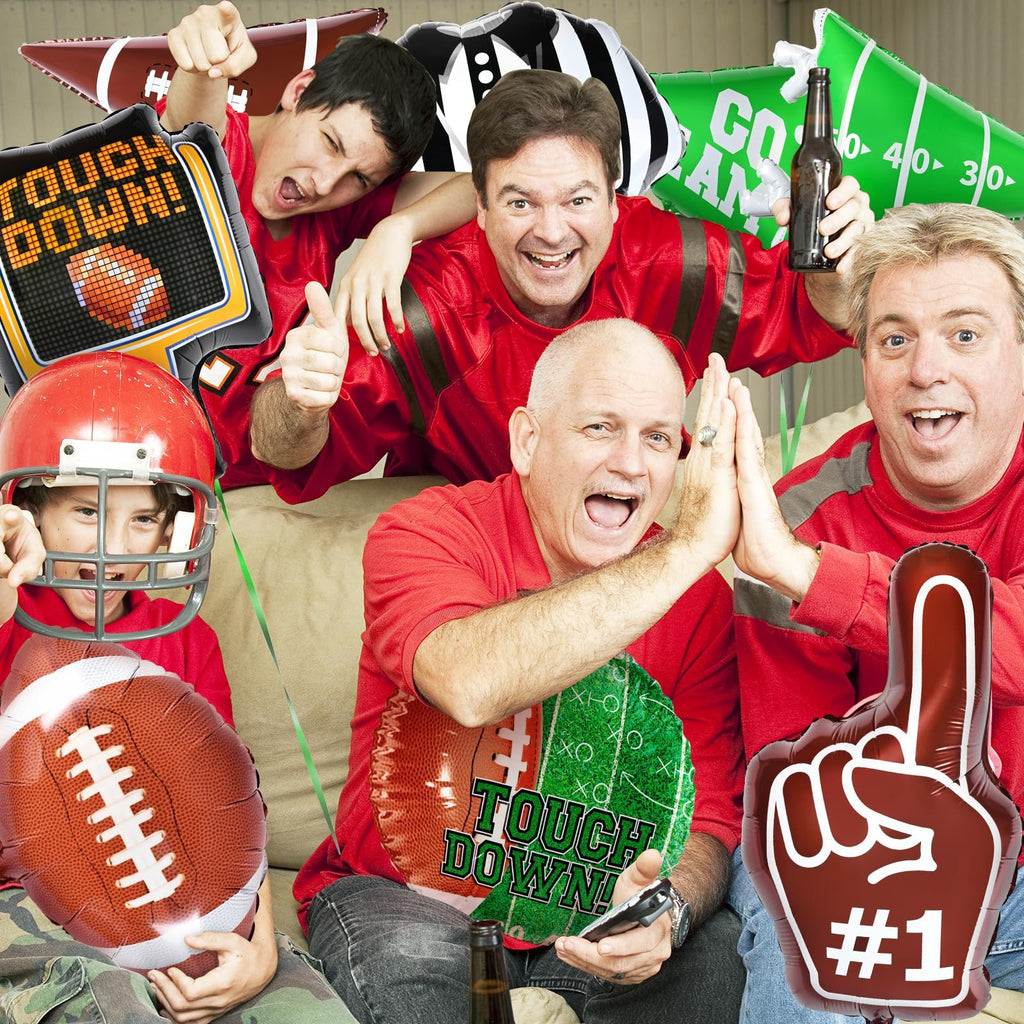 Group of men celebrating a football game with various football-themed balloons and a referee shirt balloon.