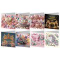 Eight diamond painting greeting cards featuring birthday themes like cakes, unicorns, and crowns, all adorned with rhinestones.