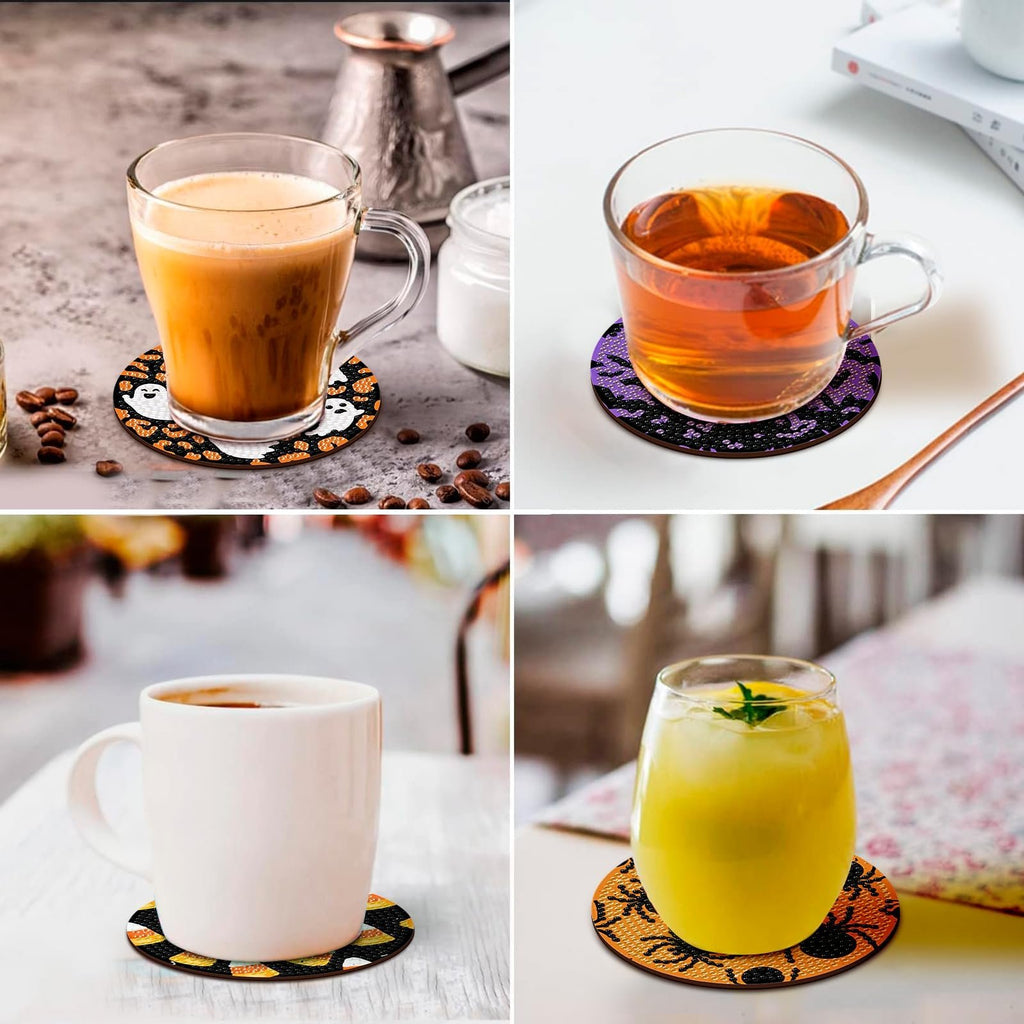 Four Halloween-themed diamond art coasters with drinks on them, showing ghosts, candy corn, and spiders.