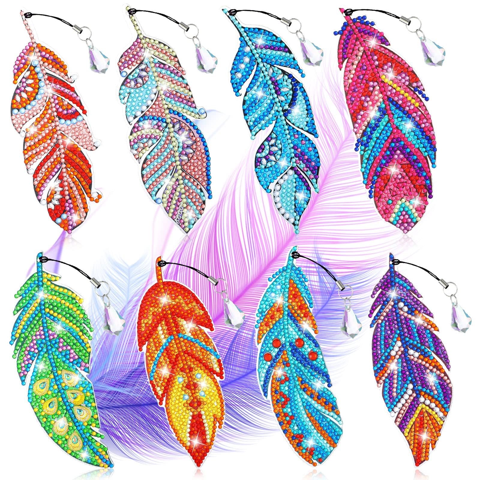 Eight colorful diamond painting feather bookmarks with crystal charms, displayed against a soft purple feather background.