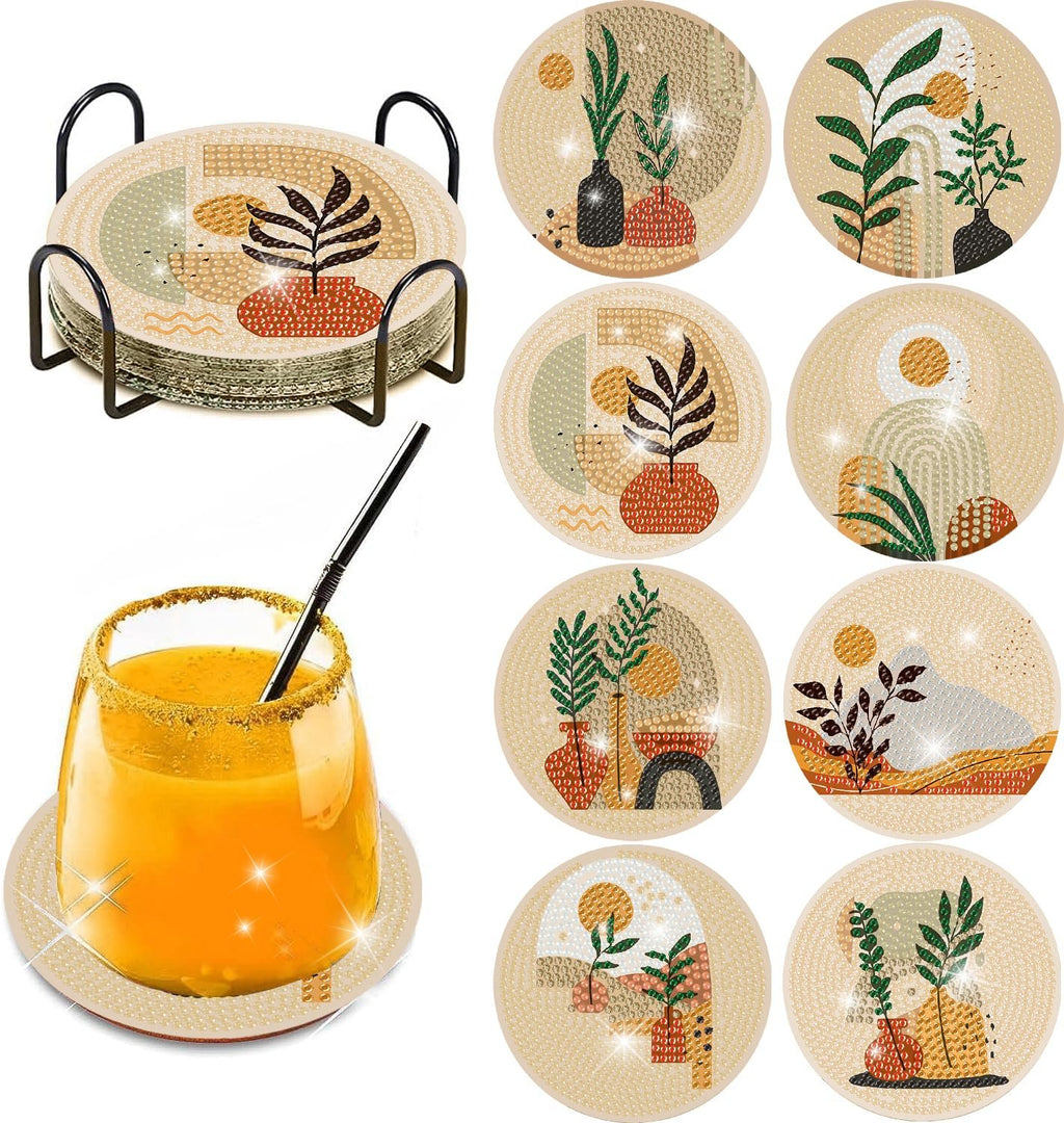 Bohemian style diamond painting coasters with abstract landscape designs on a stand and one in use with a drink.