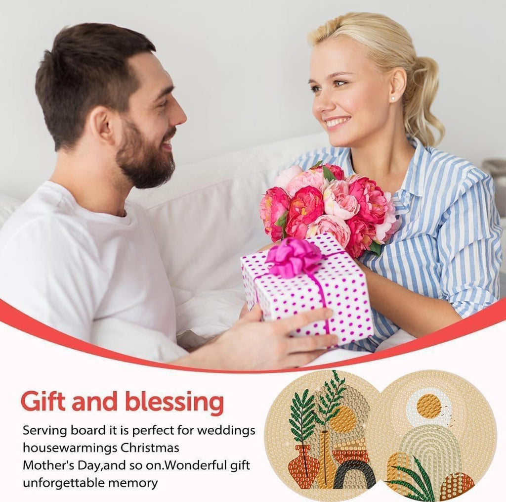 Couple exchanging a gift and flowers, with two diamond art coasters shown.