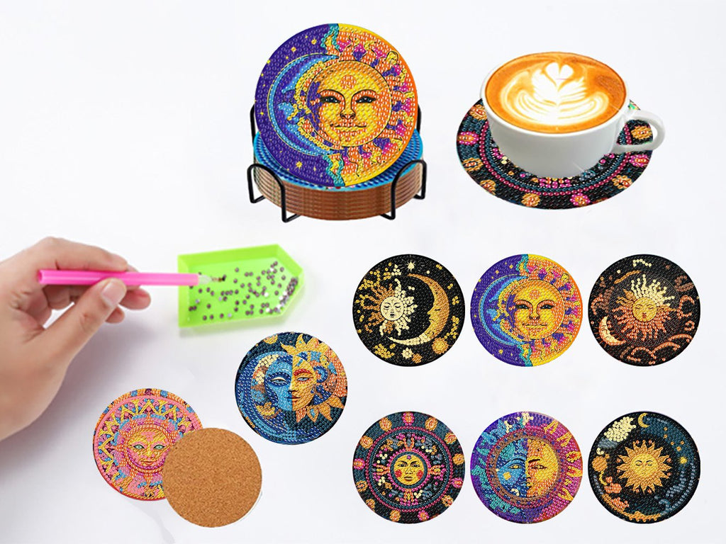 Diamond art coaster kits with holder and cup of coffee, showing various sun and moon designs and diamond painting tools.