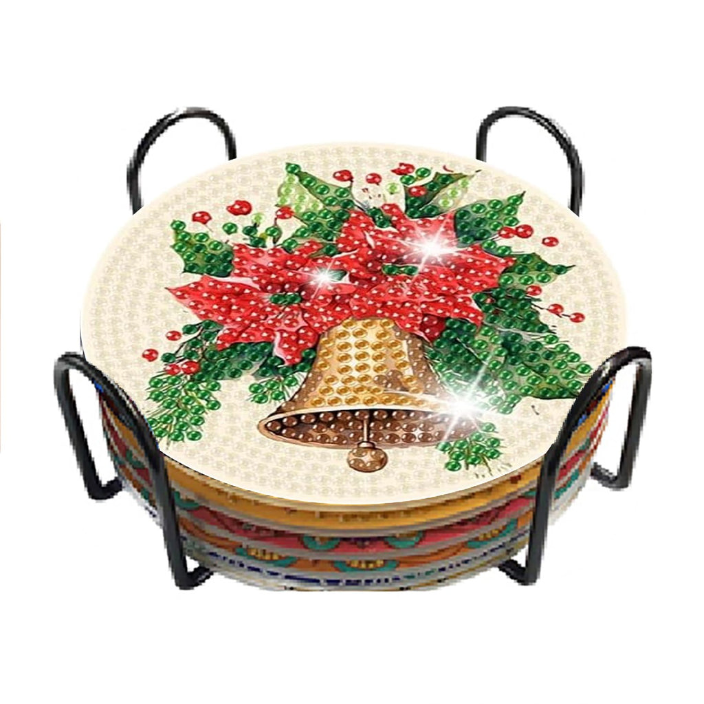 Christmas diamond painting coasters with poinsettias and bell design in a black metal holder