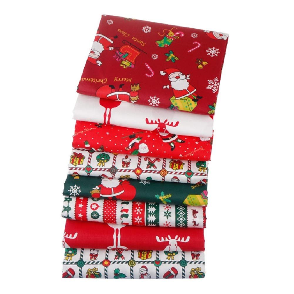 Stack of eight Christmas-themed cotton fat quarter fabric squares with Santa, reindeer, and candy cane patterns.