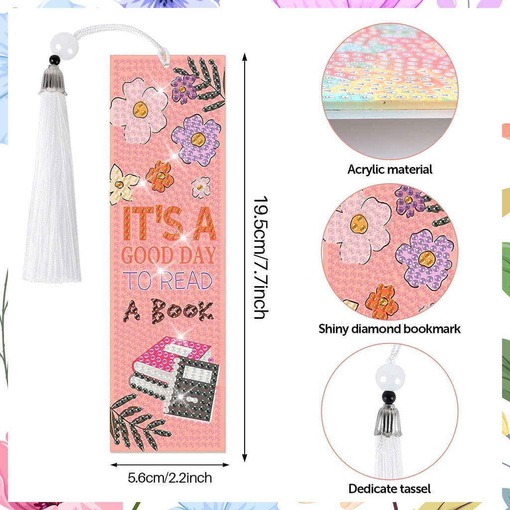 Diamond art bookmark kit with white tassel, featuring flowers and books, with text 'It's a good day to read a book'.