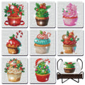 Diamond art painting coasters with Christmas cupcake designs and a black metal holder