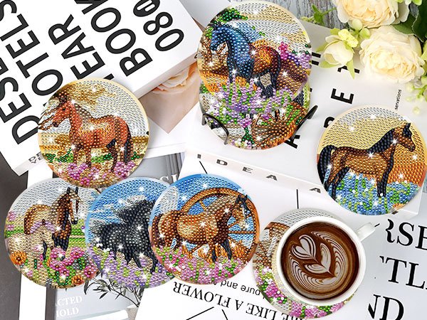 Diamond art horse coasters and holder with a coffee cup, displayed on books and flowers.