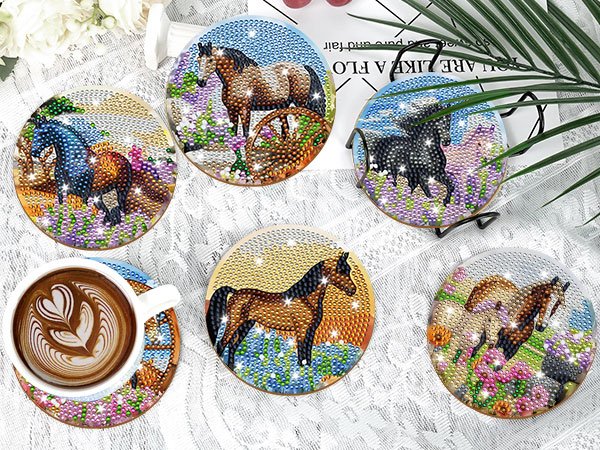 Diamond art horse coasters with holder and a cup of coffee on a lace tablecloth