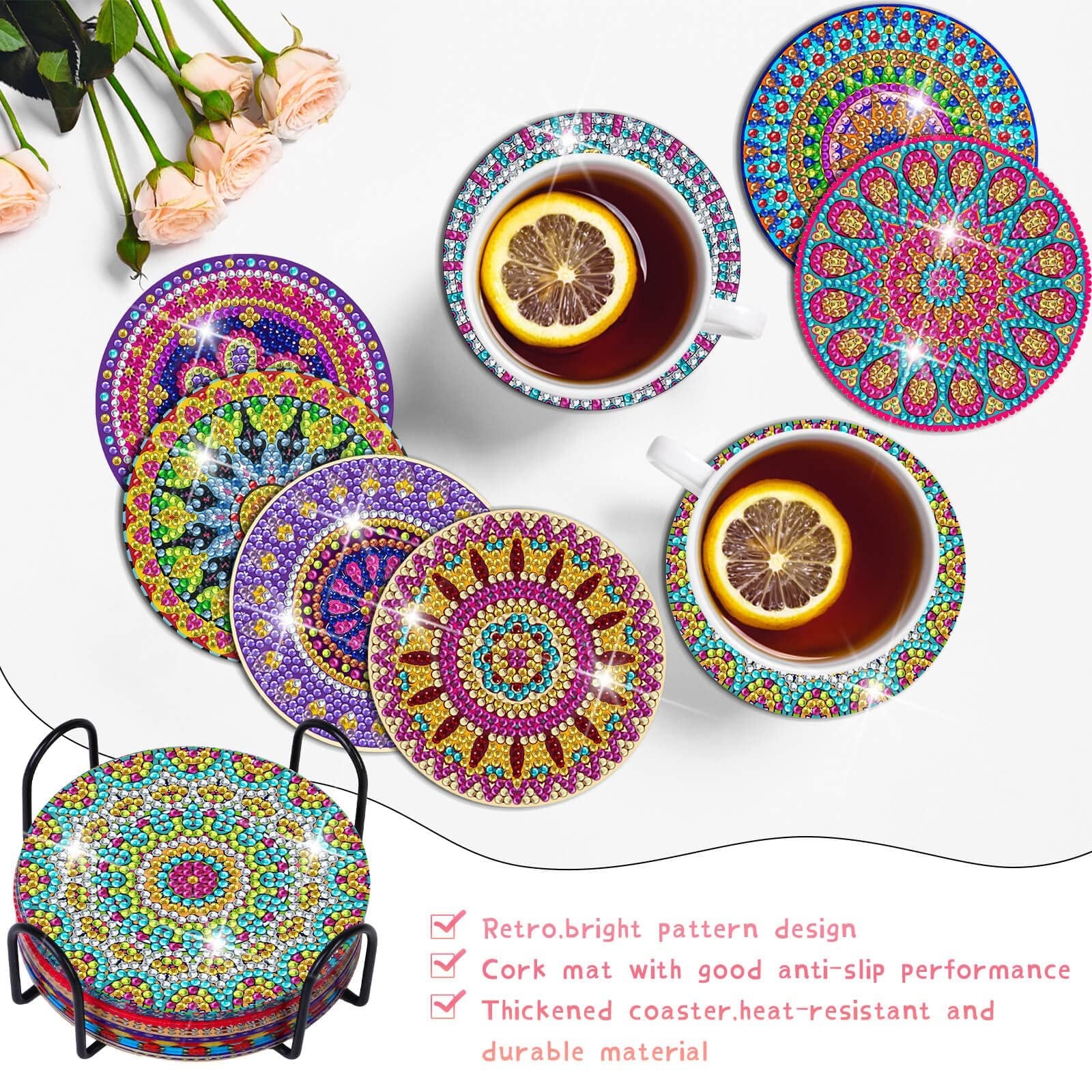 Diamond painting coasters with mandala patterns displayed on a holder and in cups of tea, with roses in the background.