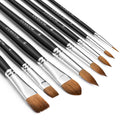 Eight sable watercolor paint brushes with black handles and silver ferrules, angled view on white background.