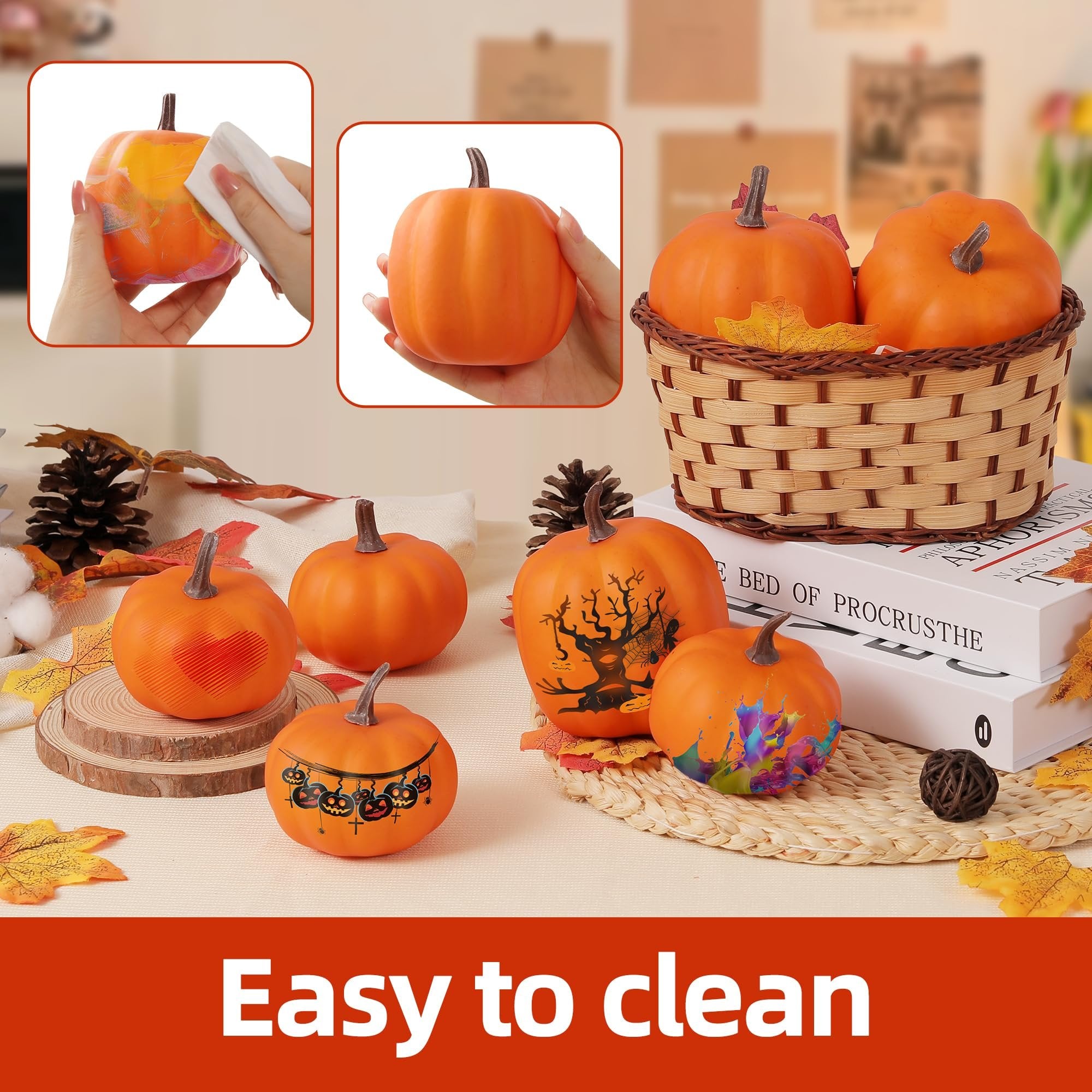 Set of artificial pumpkins with Halloween and fall designs, one being cleaned with a wipe.
