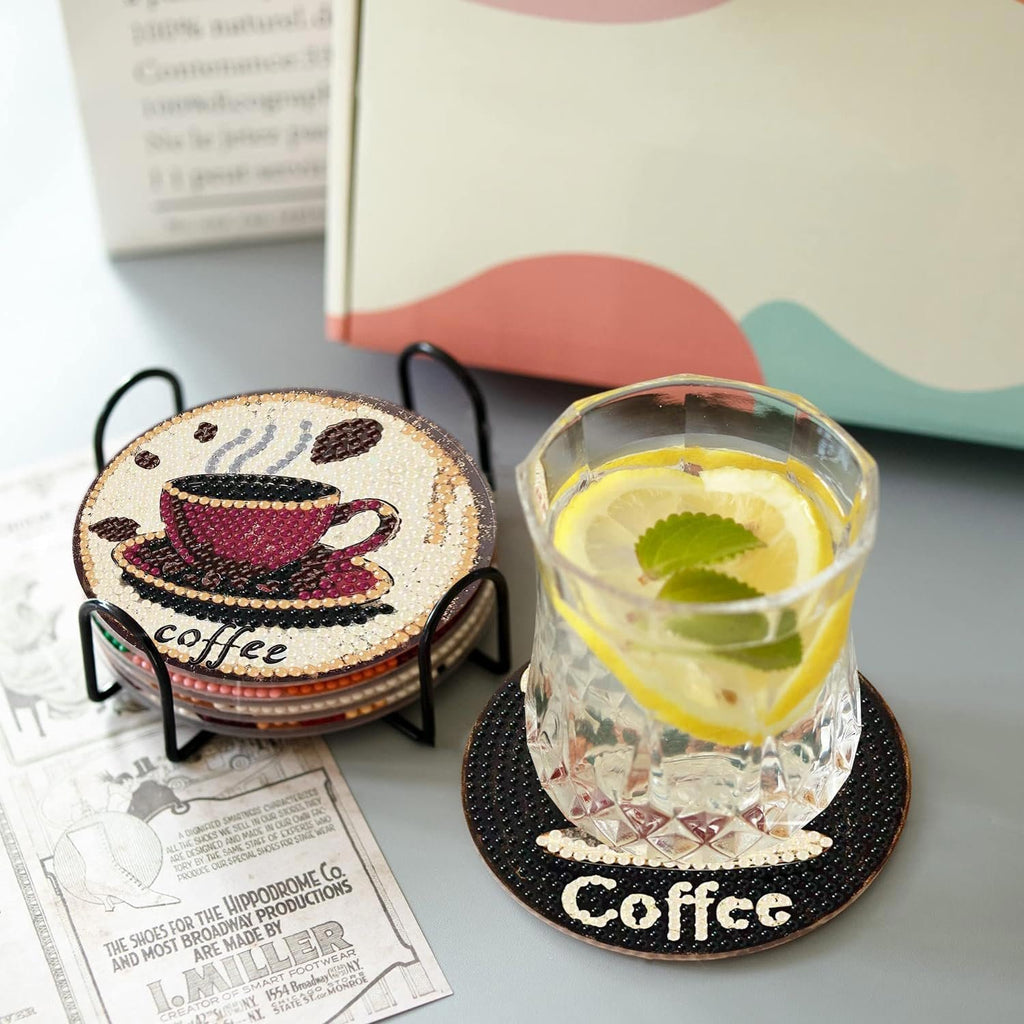 Diamond art coffee coasters in a holder next to a glass of lemonade, with vintage shoe advertisements.