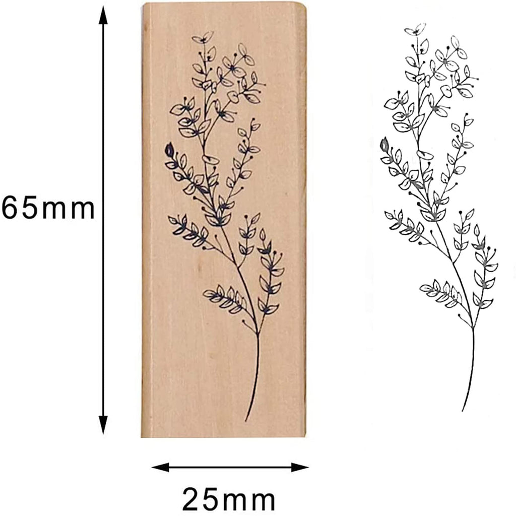 Wood mounted rubber stamp with a delicate vine and leaf design, shown next to a sample impression. Dimensions 65mm x 25mm.