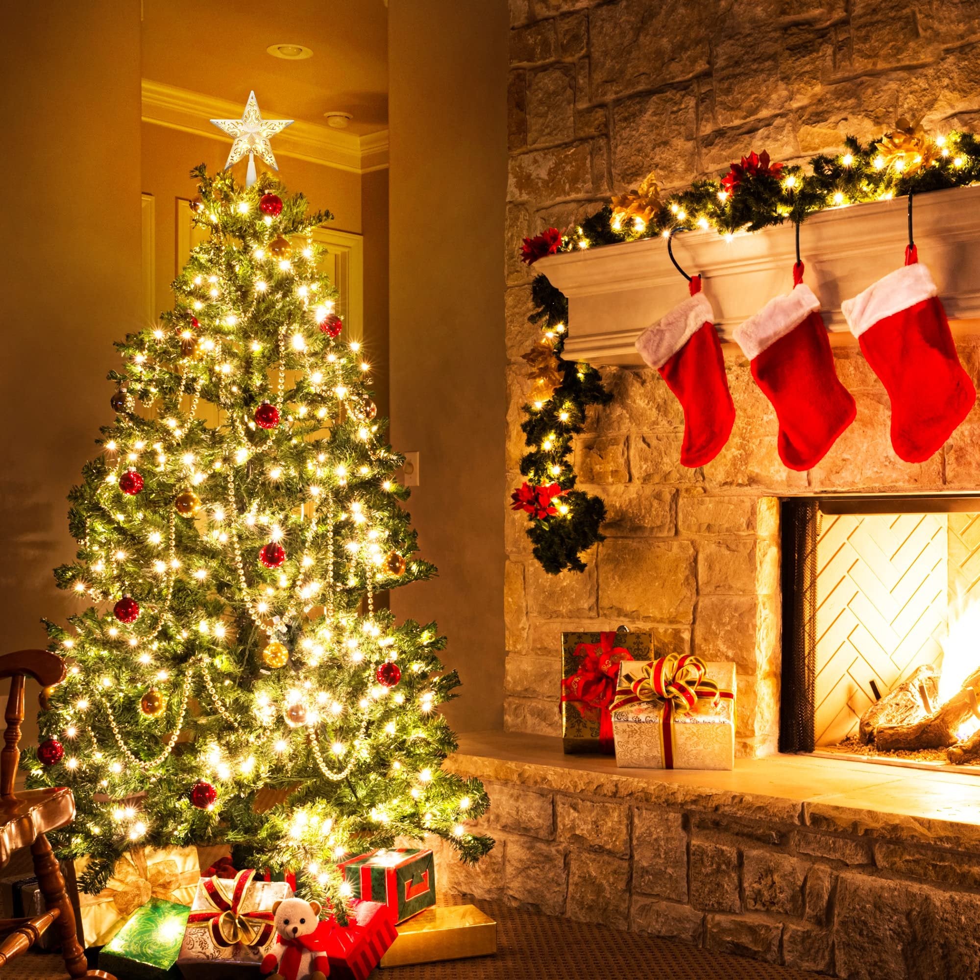 Christmas tree with star topper and presents, next to a fireplace with stockings and gifts on the mantel