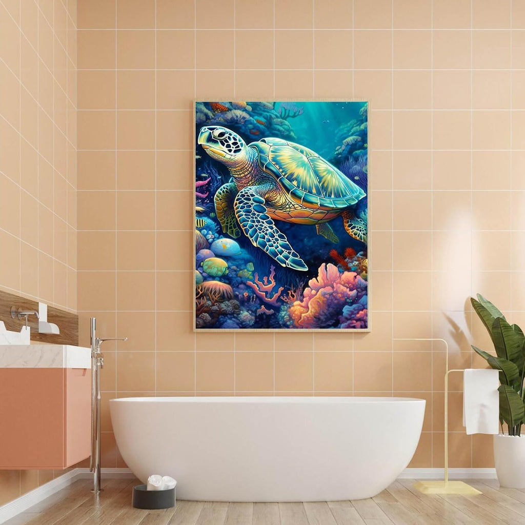 Framed paint by numbers canvas featuring a sea turtle swimming among colorful coral and fish, displayed in a bathroom setting.