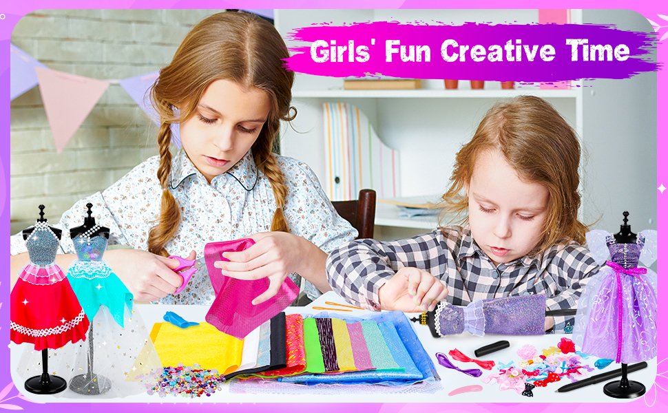 Two girls crafting doll clothes with fabric scraps, embellishments, and mannequins on a table.